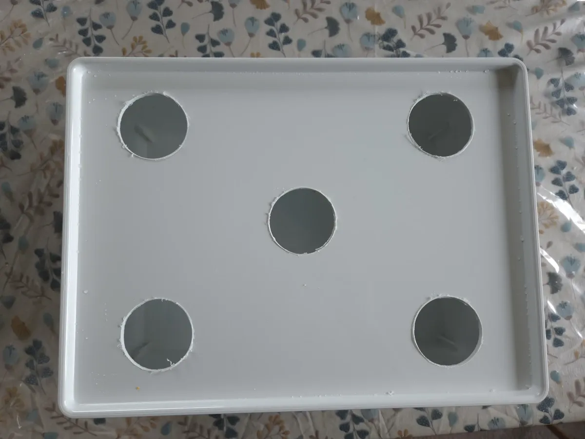 Borrade hål i IKEA Kuggis-lock för nätkorgar